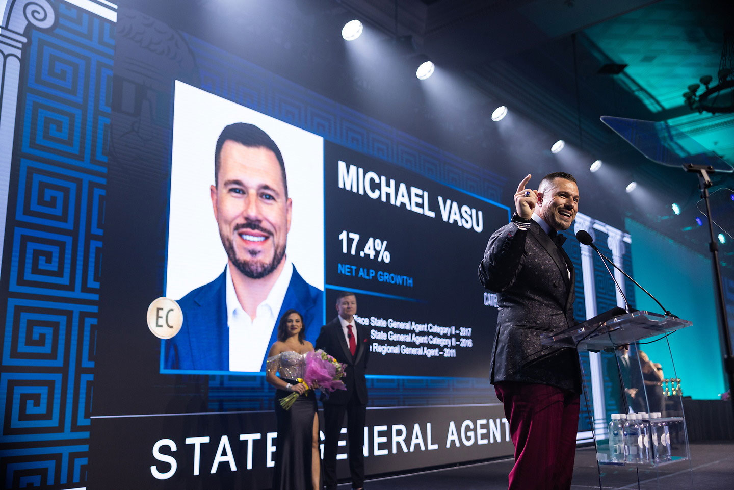 Michael Vasu on stage at a Globe Life event
