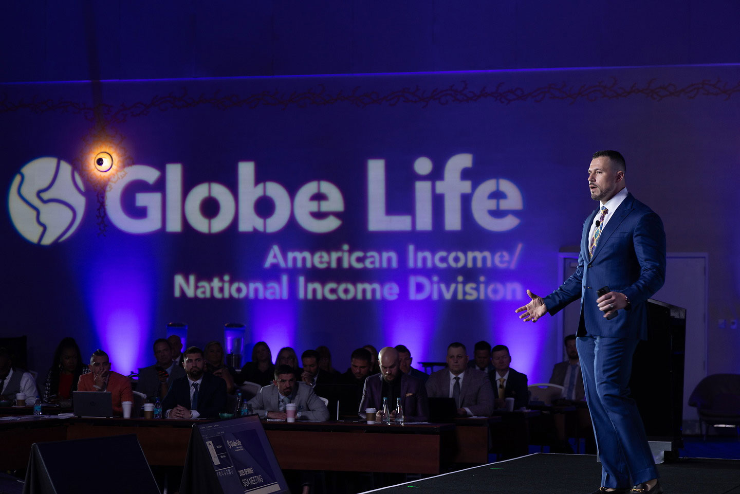 Michael Vasu, State General Agent, on stage